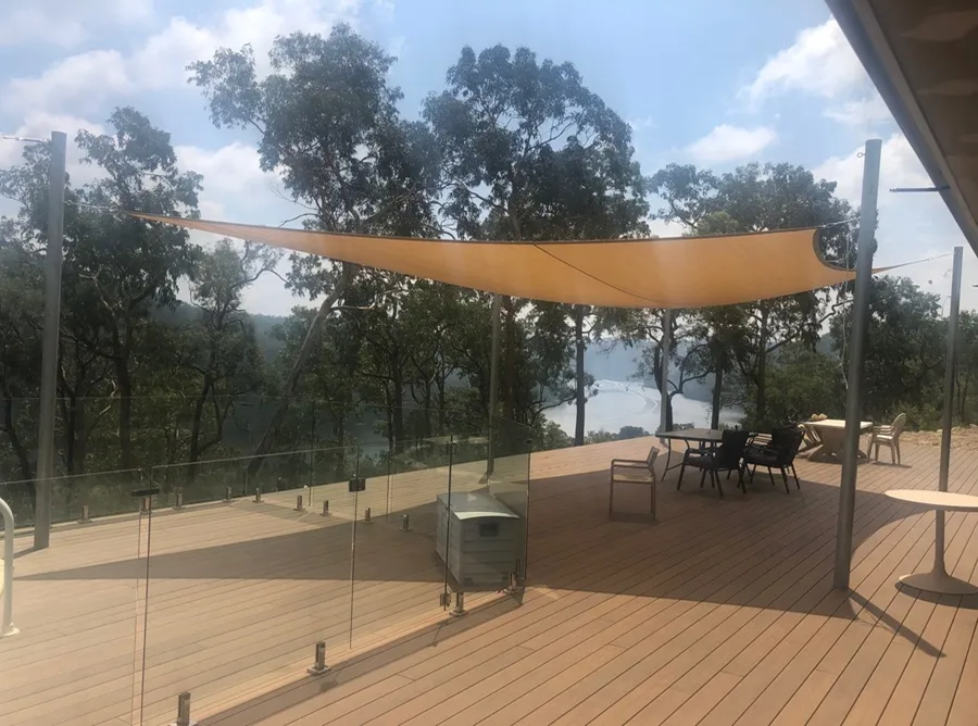 Shade sail covered deck.webp width=900 height=688